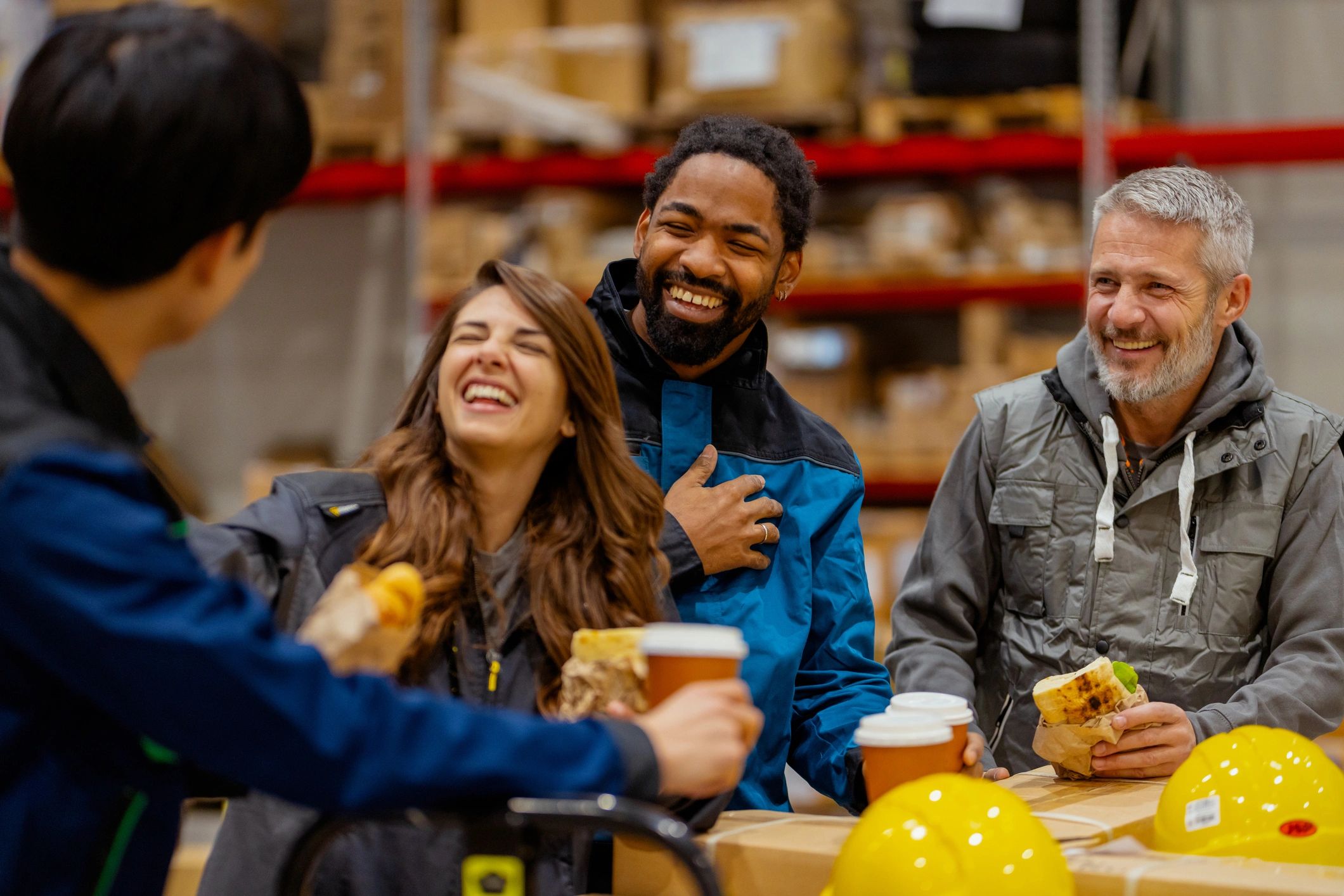 Warehouse team members on a break, representing a friendly, people-first culture